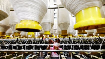 纺织企业开足马力促生产，针纺织品市场活力涌动